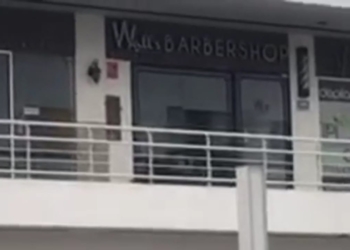 Hallan cuerpo afuera de barbería de secuestrado