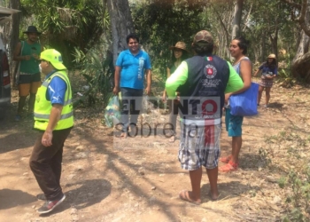 Grupo de personas acampan y realizan actividades al aire libre sin obedecer a las autoridades
