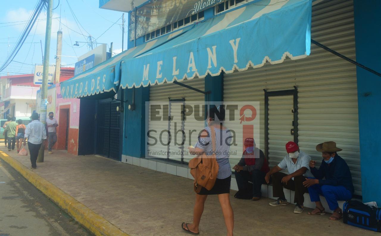 El regreso al semáforo rojo comercios no esenciales cierran sus puertas