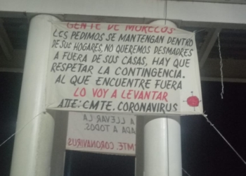 Aparece manta con advertencia del CMTE. Coronavirus
