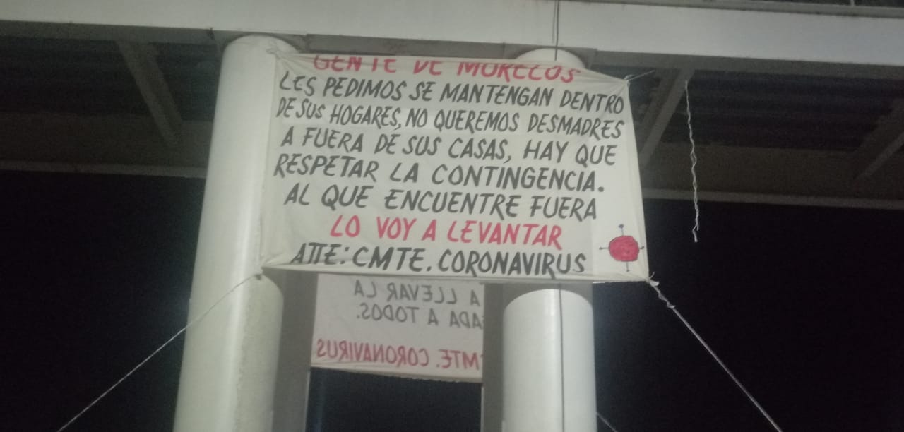 Aparece manta con advertencia del CMTE. Coronavirus