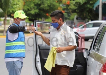 Organizan en Puerto Morelos nueva jornada de desinfección vehicular